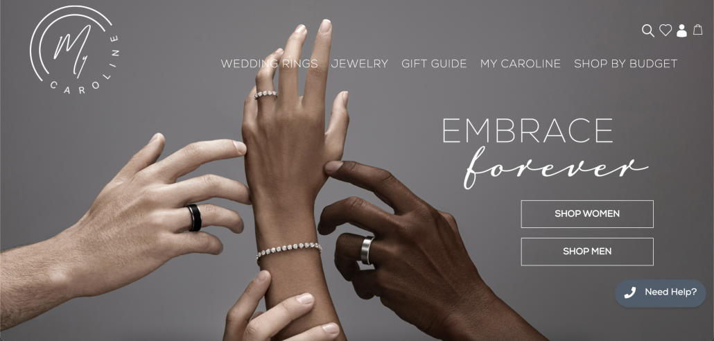 image of hands modeling rings and jewelry on website homepage with My Caroline logo and headline "Embrace Forever"